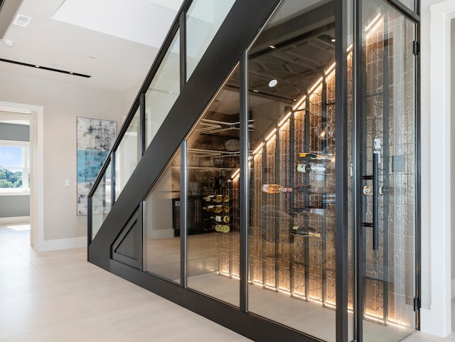 wine area with tile patterned flooring