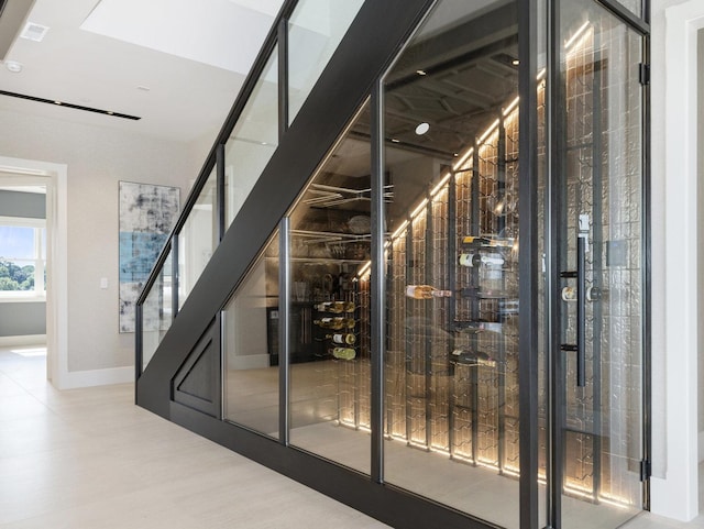 wine room featuring baseboards