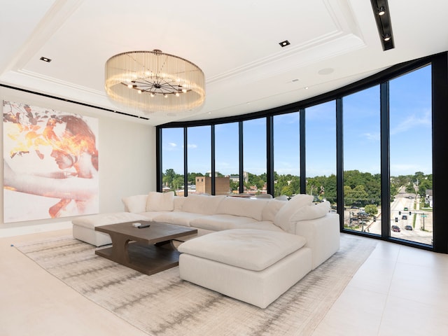 living room with a chandelier, floor to ceiling windows, a raised ceiling, and light tile patterned floors