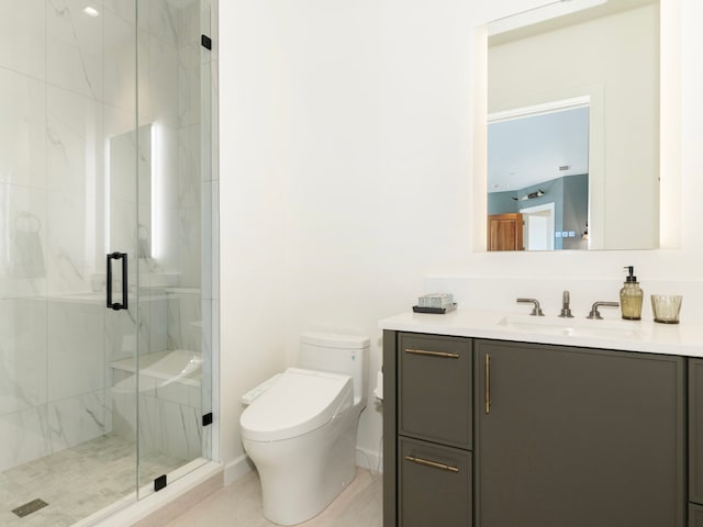 bathroom featuring vanity, a shower with door, and toilet