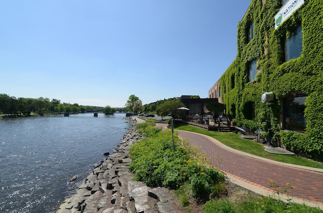 exterior space with a water view