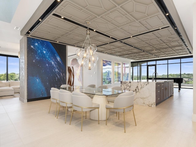 dining area with an inviting chandelier, floor to ceiling windows, and visible vents
