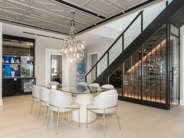 dining room with stairs, beverage cooler, and a notable chandelier