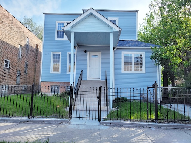 view of front of property with a front yard