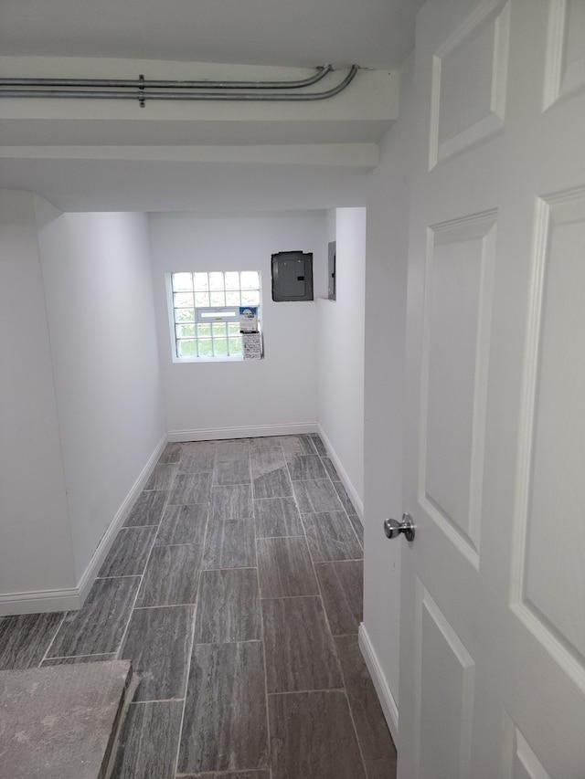 washroom featuring electric panel and dark hardwood / wood-style floors