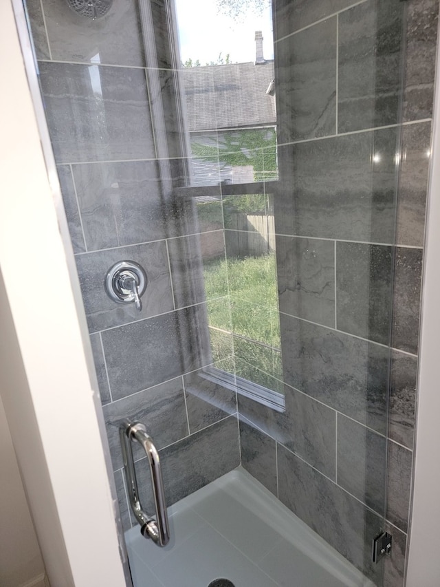 bathroom with an enclosed shower