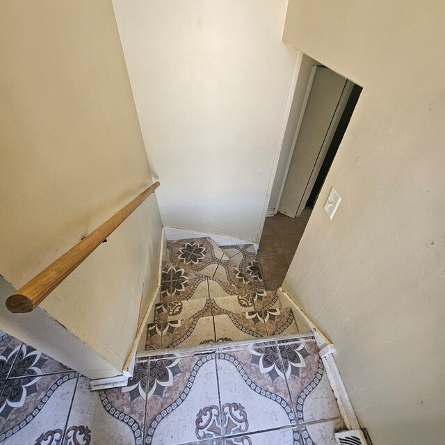 stairs with tile floors