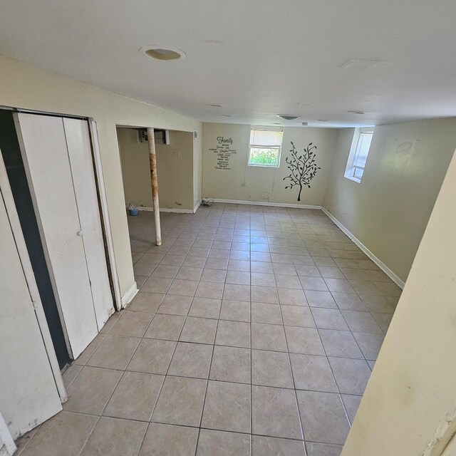 basement with light tile flooring