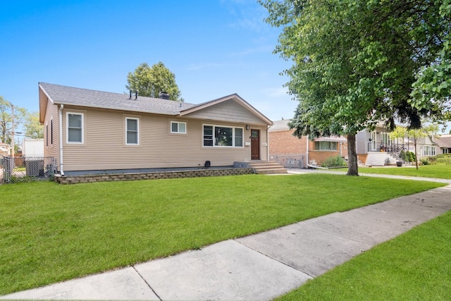 view of front of home featuring a front yard