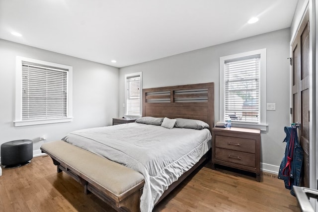 bedroom featuring wood-type flooring