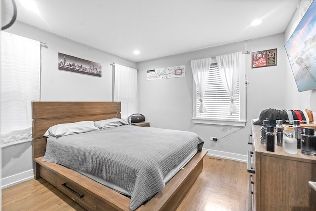 bedroom featuring light hardwood / wood-style floors