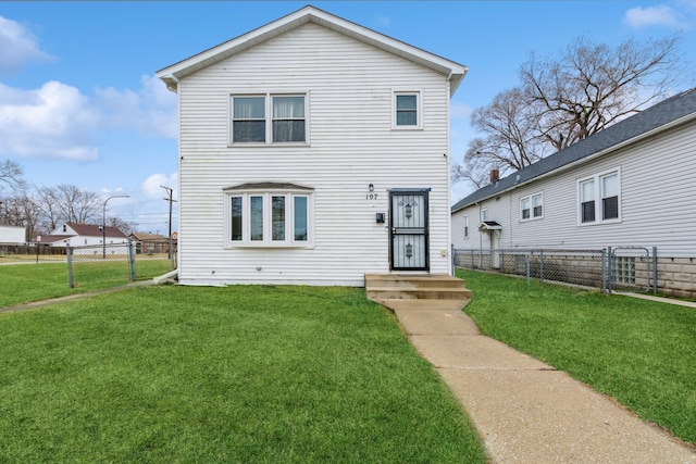 view of front facade with a front yard