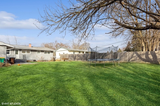 view of yard featuring a trampoline