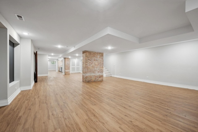 unfurnished living room featuring light hardwood / wood-style flooring