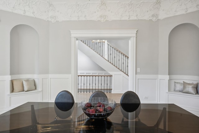 dining space featuring a chandelier