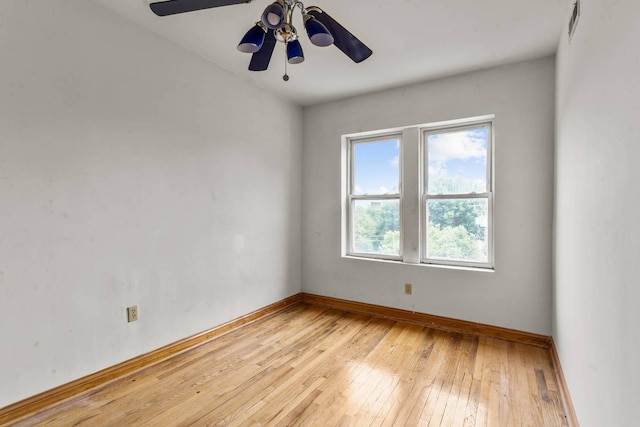 unfurnished room with light hardwood / wood-style floors and ceiling fan