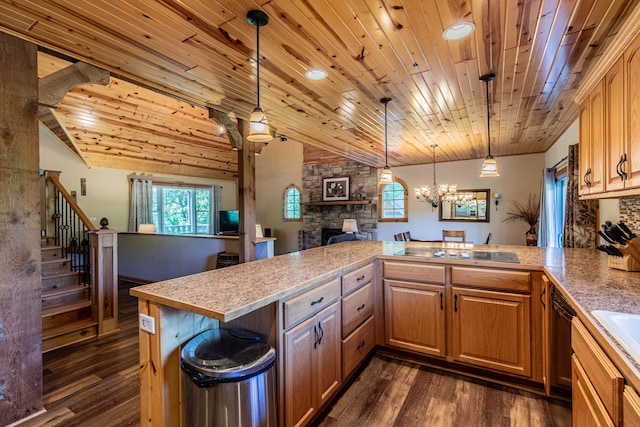 kitchen with black appliances, wooden ceiling, dark wood-type flooring, and pendant lighting