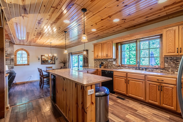 kitchen with dishwasher, wood-type flooring, a wealth of natural light, and wooden ceiling