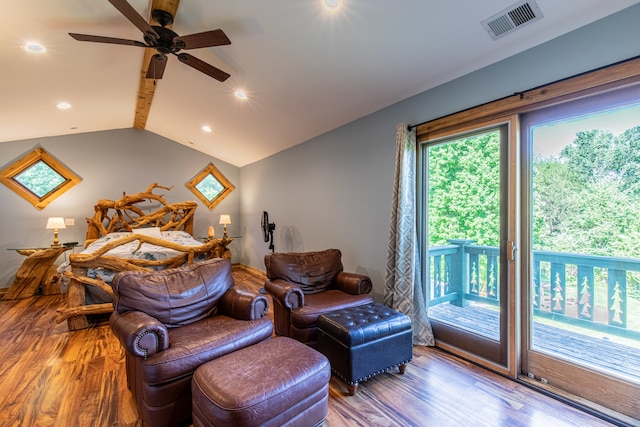 bedroom featuring vaulted ceiling, hardwood / wood-style floors, ceiling fan, and access to outside