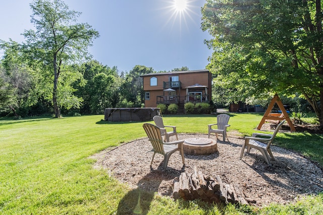 view of yard featuring a fire pit