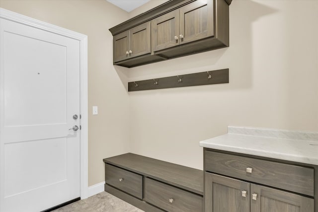 mudroom featuring light tile patterned floors