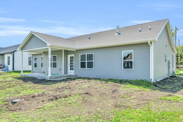 rear view of house featuring a patio