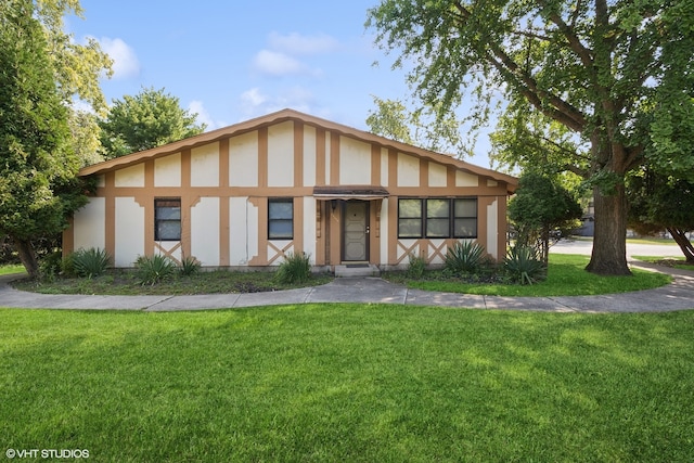 view of front of home with a front yard