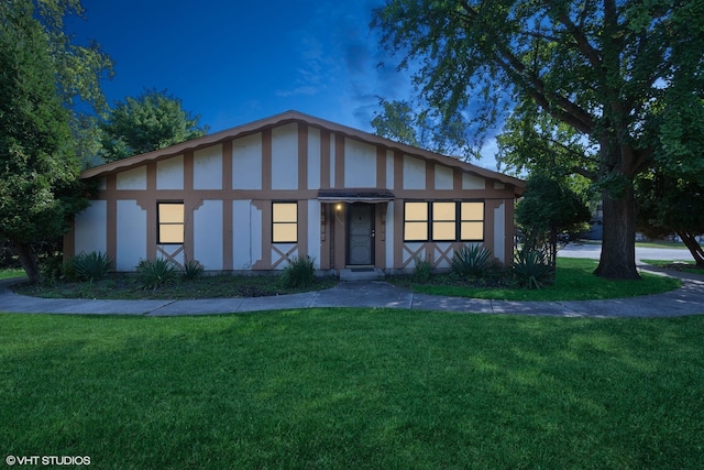 view of front of house with a front lawn