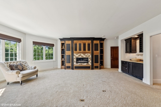 living room featuring light carpet