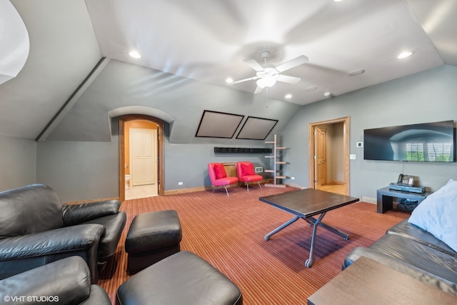 carpeted living room featuring lofted ceiling and ceiling fan