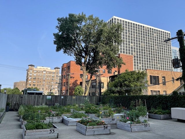 view of building exterior with fence