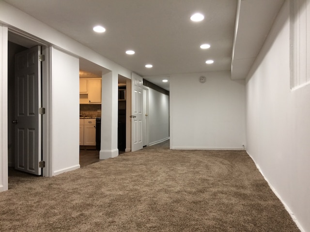 interior space featuring dark carpet