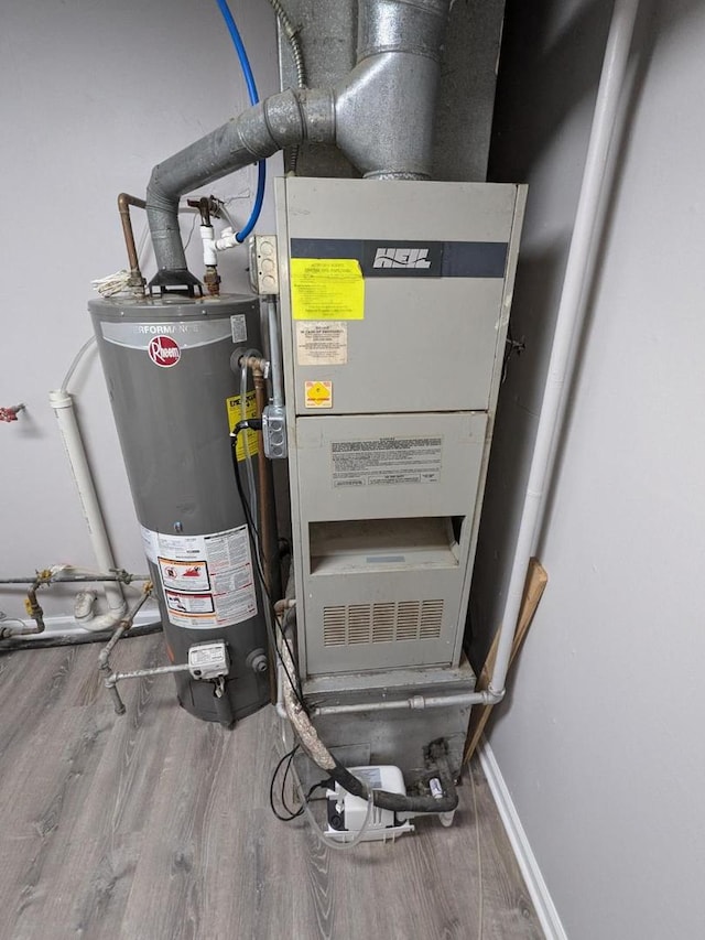 utilities with gas water heater and heating unit