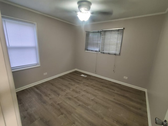 308 Minocqua St, Park Forest, IL 60466 - spare room featuring crown molding, wood finished floors, ceiling fan, and baseboards