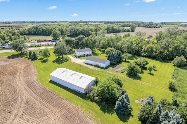 birds eye view of property with a rural view