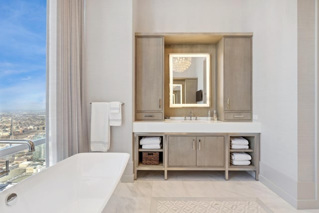 bathroom with vanity and a tub to relax in