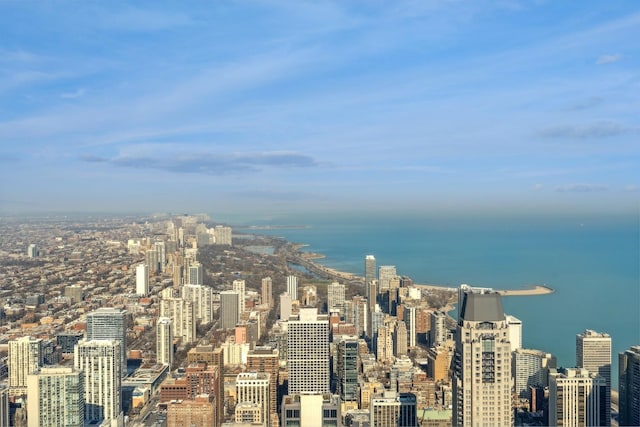 property's view of city featuring a water view