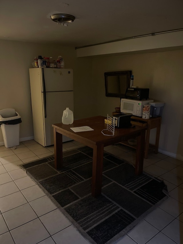 dining room featuring tile floors