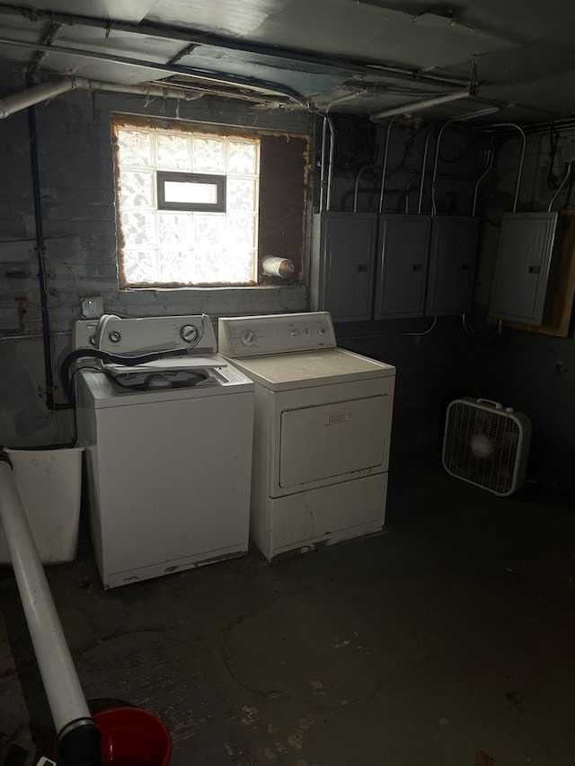 washroom featuring washer and dryer