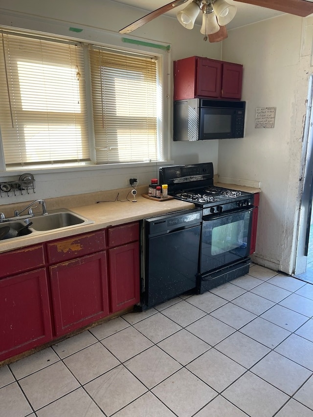 kitchen with black appliances, plenty of natural light, ceiling fan, and light tile floors