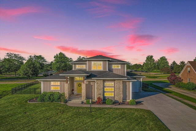 prairie-style home with a yard