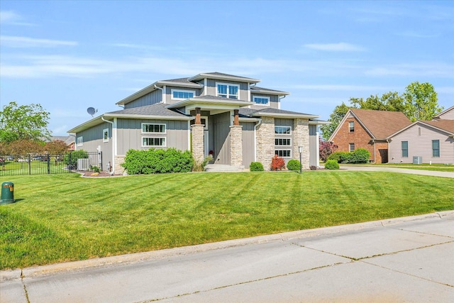 view of front of property with a front lawn