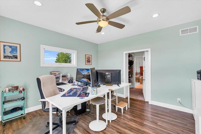 office area featuring dark hardwood / wood-style flooring and ceiling fan