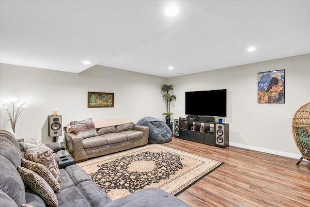 living room with light hardwood / wood-style flooring