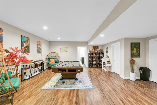 recreation room with light wood-type flooring and billiards