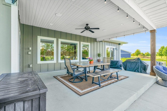 view of patio / terrace featuring ceiling fan