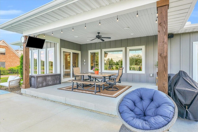 view of patio / terrace featuring ceiling fan