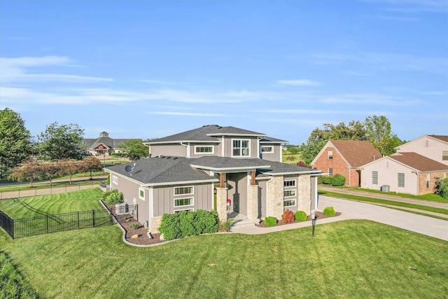 view of front of home with a front lawn