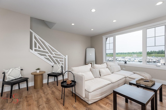 208 Leeward Way, Ottawa, IL 61350 - living area with recessed lighting, light wood-style floors, and stairway