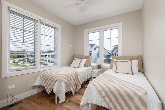 208 Leeward Way, Ottawa, IL 61350 - bedroom featuring multiple windows, wood finished floors, and ceiling fan